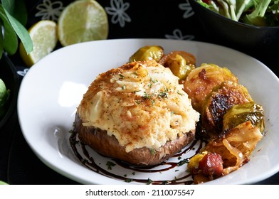 Crab Imperial Stuffed Portabella Mushroom With Side Of Honey Roasted Brussel Sprouts.