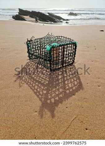 Crab and Lobster trap washed up on the beach of Portugal.