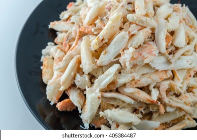 Crab Meat, Dish Black, White Background. Crab Meat For Cooking