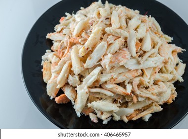 Crab Meat, Dish Black, White Background. Crab Meat For Cooking