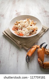 Crab Meat In A Dish On White Wood Table