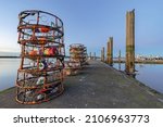 Crab Pot Cages with Bouys on Port Gardner Bay Pier at Sunset