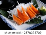 Crab sticks japanese food isolated in black background