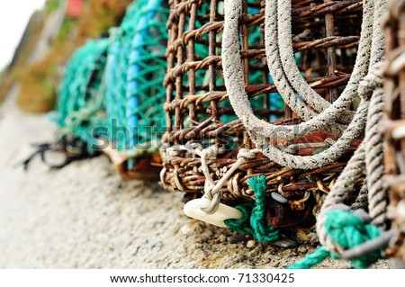 Crab/lobster pots, coastal elements.