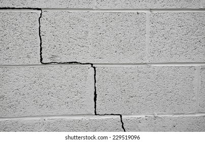 Crack in a cinder block building foundation                               