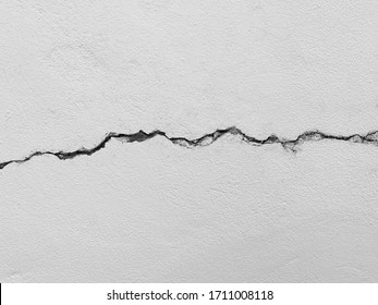 Crack concrete cement wall background in industrial building. It's high resolution surface and texture photo.
