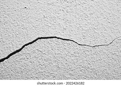 Crack in the concrete wall.