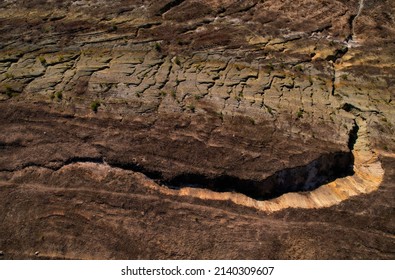 Crack In Dry Ground. Dry Lake In Process Of Drought And Lack Of Rain. Cracked Soil Of Due To Climate Change. Soil Earth Background, Top View. Relief Of Cracked Earth. Land Structure Or Ground Texture.