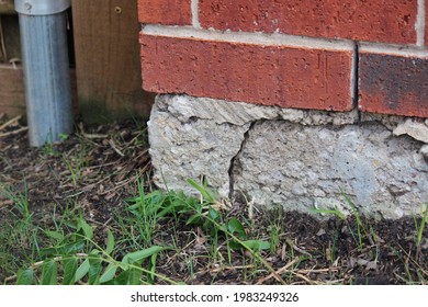 Crack Near Corner of Foundation, foundation issues on a residential property, corner crack of a foundation - Shutterstock ID 1983249326