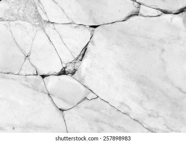 Crack On Marble Background From A Giant White Rock