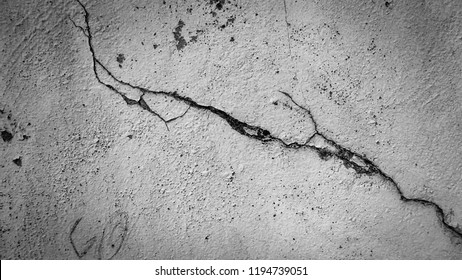 Crack on the wall background in black and white.
