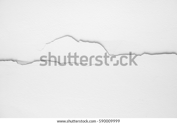 Crack On White Wall Plaster Crumbles Royalty Free Stock Image