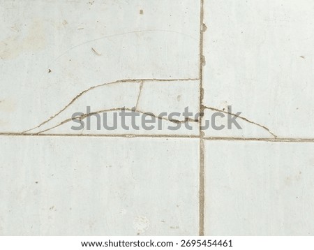 crack pattern on white tile surface with geometric art style