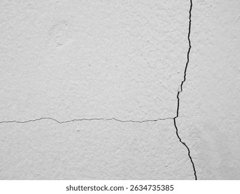 Crack wall texture background broken earthquake effect, whtie grey building cement damage pattern plaster grunge black line paint surface abstract, construction rough street concrete backdrop.