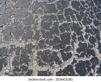 Cracked Asphalt Pavement In Los Angeles, California 