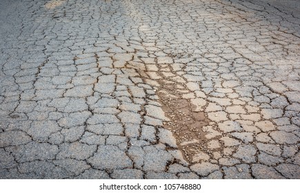 Cracked Asphalt Road Stock Photo 105748880 | Shutterstock