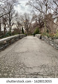 Cracked Asphalt Walking Bridge In Carl Schurz Park New York City.