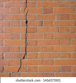 Cracked Brick Wall Caused By Earthquake Or Foundation Structural Failure