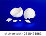 Cracked Broken Egg Shells Blue Background