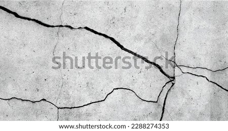Cracked cement floor texture for background.
