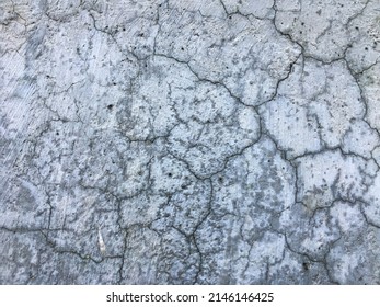 Cracked Cement Wall Surface Due To Extreme Weather Changes.