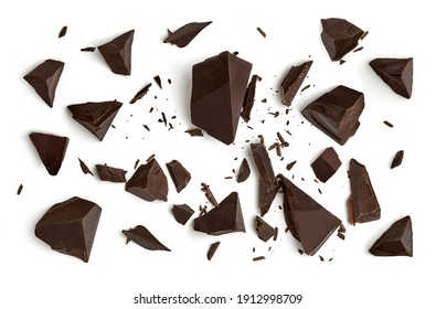 Cracked chocolates or broken chocolate chips or chocolate parts from top view isolated on white background
