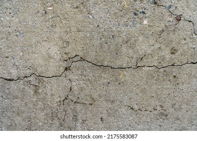 Cracked concrete slab. Wall made of cement with a crack. House foundation repair. Texture surface or background - Shutterstock ID 2175583087