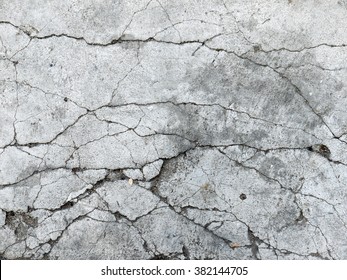Cracked concrete texture closeup background - Shutterstock ID 382144705