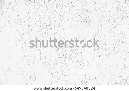 Cracked concrete wall background. Grunge black and white texture template for overlay artwork. 