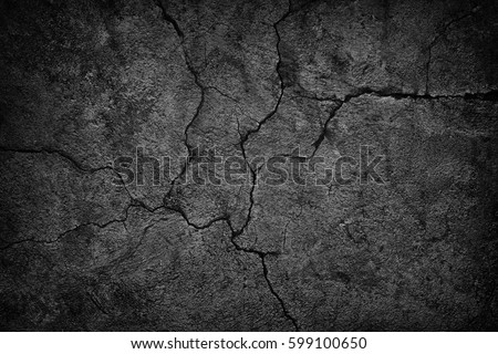 cracked concrete wall covered with gray cement surface as background