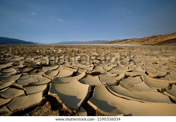 Cracked desert earth with crust of salt, Death\
Valley National Park, Nevada,\
U