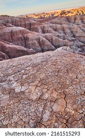 Cracked Desert Grounds Of Badlands Sediment Layers