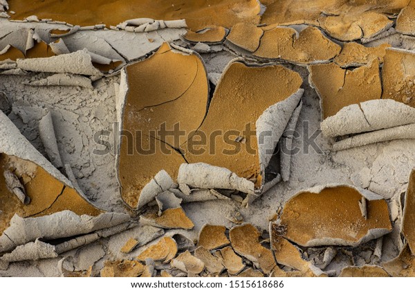 Cracked dry ground sand on the nature outdoors.
Texture, background,
sample
