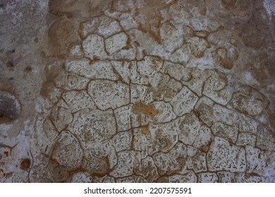 Cracked Earth From Chemical Exposure In The Place Of Potash Salt Extraction. Concept Of Environmental Disaster And Habitat Destruction
