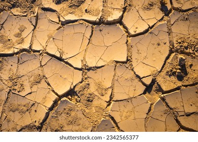 Cracked earth texture in Mesquite Flat of Death Valley in Stovepipe Wells, California, USA