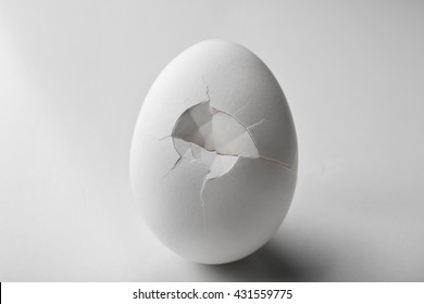 Cracked Egg On White Background