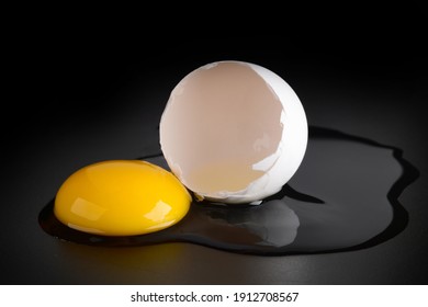 Cracked Egg Studio Isolated On Dark Background