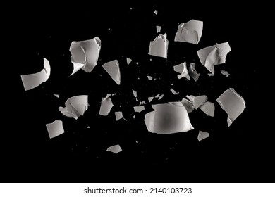 Cracked eggshell pieces isolated on black, clipping path - Powered by Shutterstock