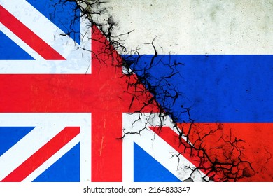 Cracked Flags Of Russia And England. International Political Relations. Conflict. Political Economic Background. Politics.