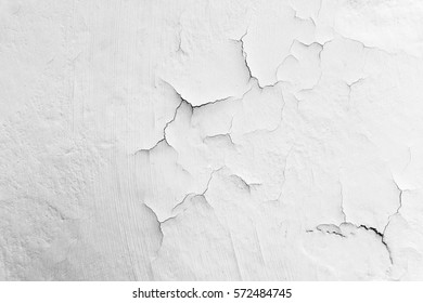 Cracked flaking paint on wall, background texture