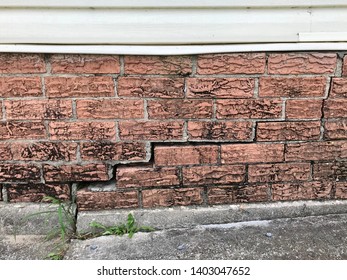 Cracked Foundation Of House Likely As A Result Of Settlement Or Flood Damage