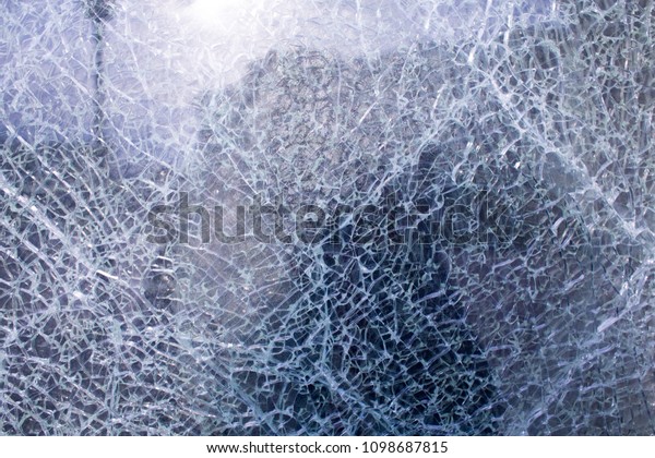 Cracked glass, broken glass, cracks on the\
glass, car accident