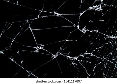 cracked glass isolated on a black background. broken  - Shutterstock ID 1541117807
