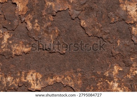 Cracked heavy rust layer on corroded metal sheet