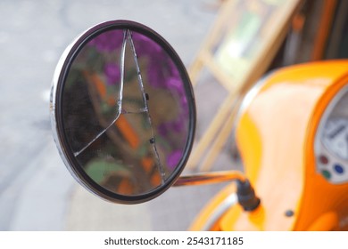 A Cracked Mirror Reflection displayed beautifully on a Vintage Scooter full of character - Powered by Shutterstock