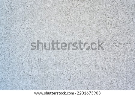 cracked paint texture, Finely cracked texture template. Easy to create abstract scratched, cracked effects. Fine cracks in the coating on the metal surface - grunge texture. Old cracked paint. Banner