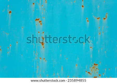 Cracked painted old metal texture. Turquoise color. Rusted surface.