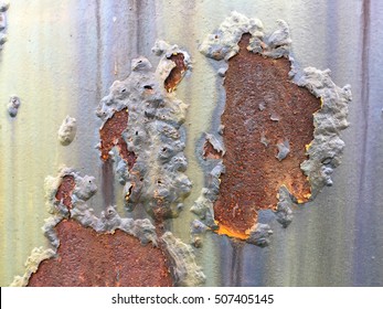 Cracked and peeled metal with rust texture