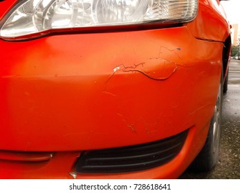 Cracked And Peeling Paint On An Old Car.