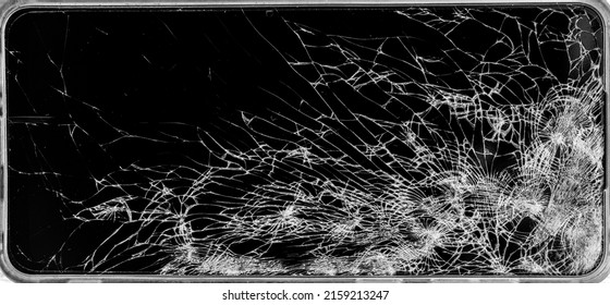 Cracked Pnone Screen With Big Hole Shot. Broken Cracks Glass Fracture Effect Texture Isolated Abstract Black Background. Top View